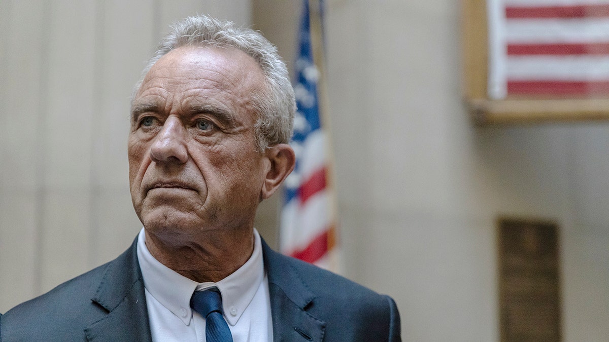 RFK Jr closeup with US flag behind him