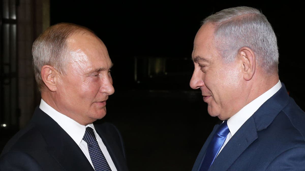 Putin greets Netanyahu